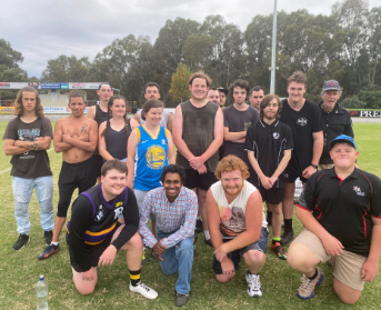 The Merriwa Magpies All Abilities AFL team on a footy oval
